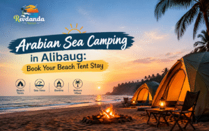 Arabian Sea camping in Alibaug with beach tents, bonfire, sunset, and Revdanda Tourism logo